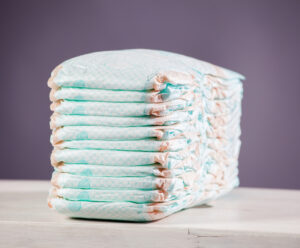 A neatly arranged stack of diapers.