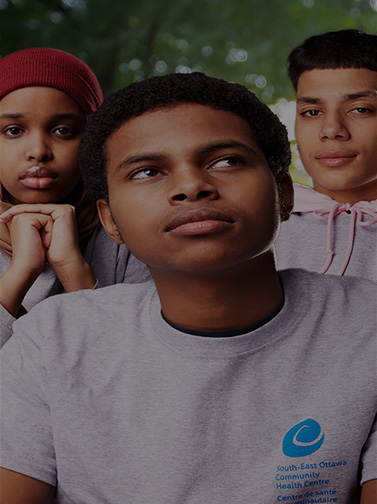 three youths from seochc posing for portraits