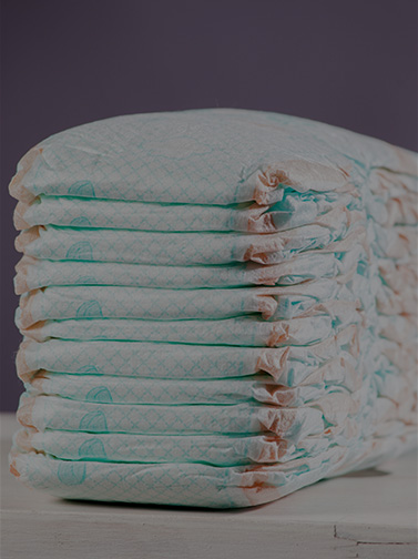 A neatly arranged stack of diapers.