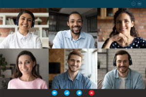 Six multicultural participants in a video conference call.